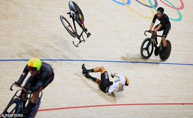 Spanish rider Albert Torres was thrown through the air after hitting Belgian Fabian Van de Bossche