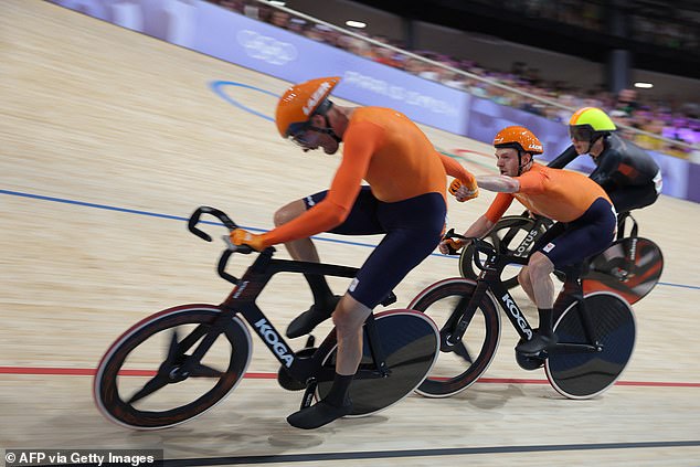 Dutch Yoeri Havik and Dutch Jan Willem van Schip relay in the final of the men's track cycling