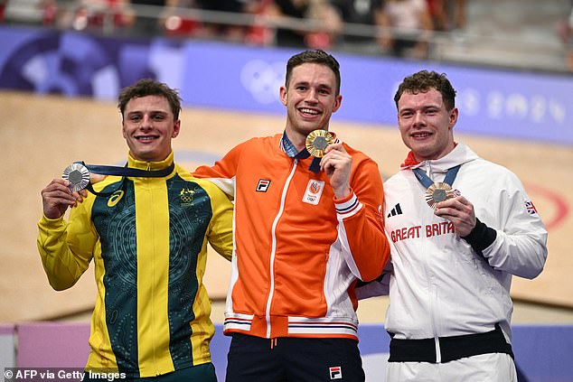 Carlin, right, was booed by Dutch fans as he accepted his bronze medal on Friday