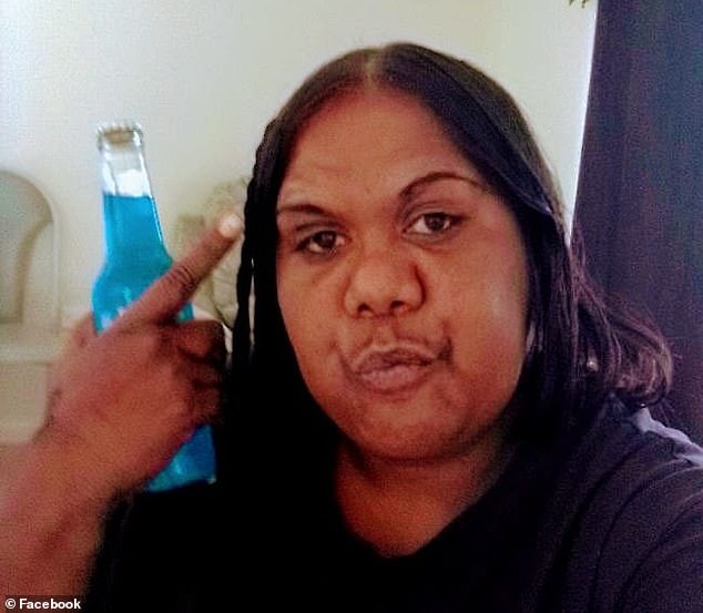 The mother of five (pictured) smashed a bottle on the rocks before stabbing her relative, who suffered a deep wound to the left side of her jaw