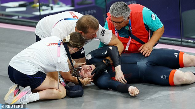 1723380890 187 Team GB star Jack Carlin is treated by medics after