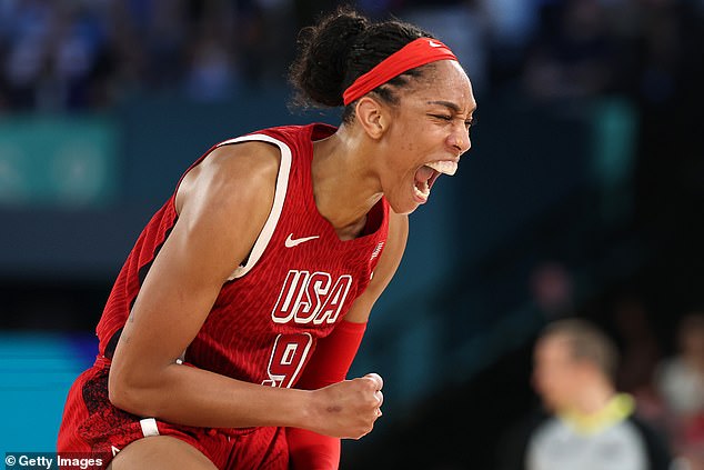 A'ja Wilson scored 21 points as the women's team survived the toughest challenge of an unprecedented run of eight straight Olympic gold medals