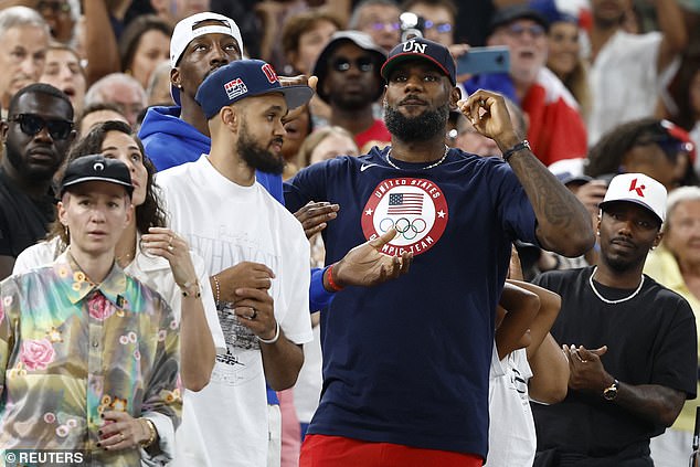 LeBron, Adebayo and Derrick White (third from right) enjoyed the women's victory on Sunday