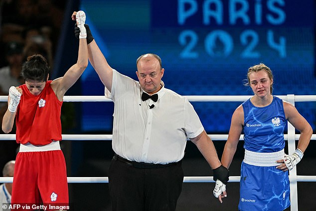 Lin raised her hand after winning all three rounds and defeating Szeremeta by unanimous decision