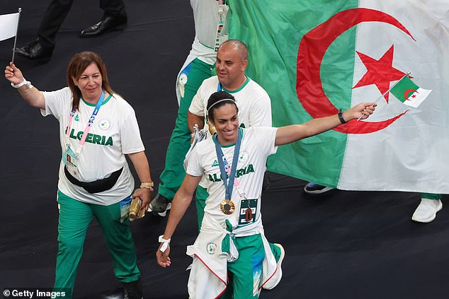 The 25-year-old welterweight boxer has become a national hero and was selected on Sunday as one of the Algerian flag bearers for the closing ceremony of the Olympic Games in Paris.