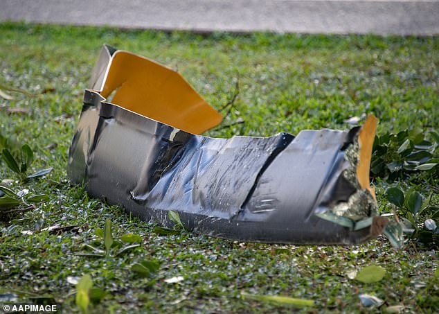 Debris from the helicopter that crashed into the luxury hotel early Monday morning