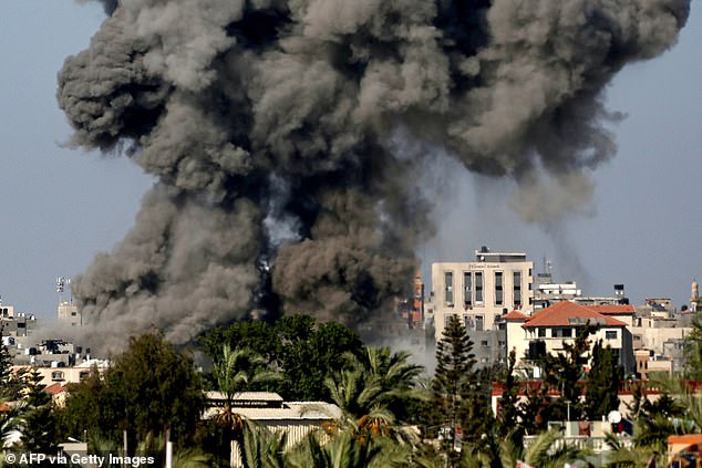 Smoke clouds after Israeli bombardments in Nuseirat in the central Gaza Strip on Sunday