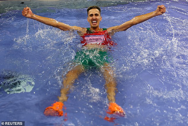 A participant in the steeplechase event at the Paris Olympics