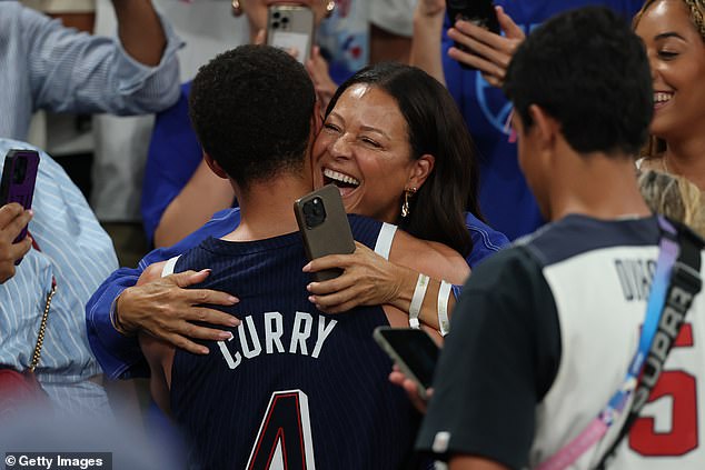 Stephen Curry hugs his mother, Sonya, after beating France for the gold medal in Paris