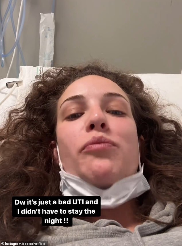 The media personality shared a video of herself lying in a hospital bed on Monday as her musician boyfriend fed her chips