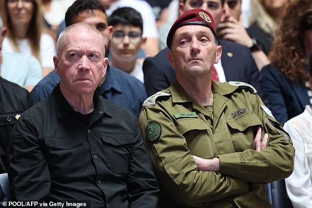 Israeli Defense Minister Yoav Gallant (left) has now warned Iran and Hezbollah to avoid retaliatory actions against Israel. He is pictured with Army Chief of Staff Herzi Halevi