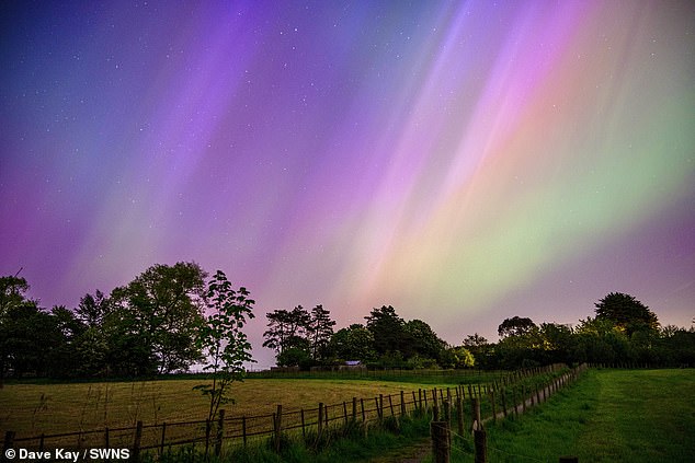 Auroras are caused by disturbances in the Earth's 'magnetosphere' (the system of magnetic fields) caused by strong activity on the Sun. Tonight's aurora is from a coronal mass ejection (CME) - a huge ejection of plasma from the Sun's corona, its outermost layer. Pictured, the Lancashire aurora, 10 May 2024