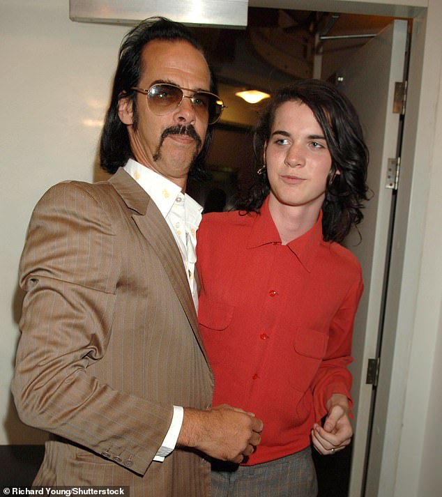 Jethro (pictured right), who struggled with drug addiction, died in Melbourne in 2022, two days after being released from prison (pictured left Nick Cave)