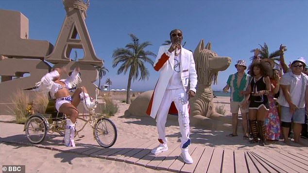 Los Angeles showed it's ready for the Games with live performances from California native Snoop Dogg (pictured), the Red Hot Chili Peppers and Billie Eilish on Venice Beach