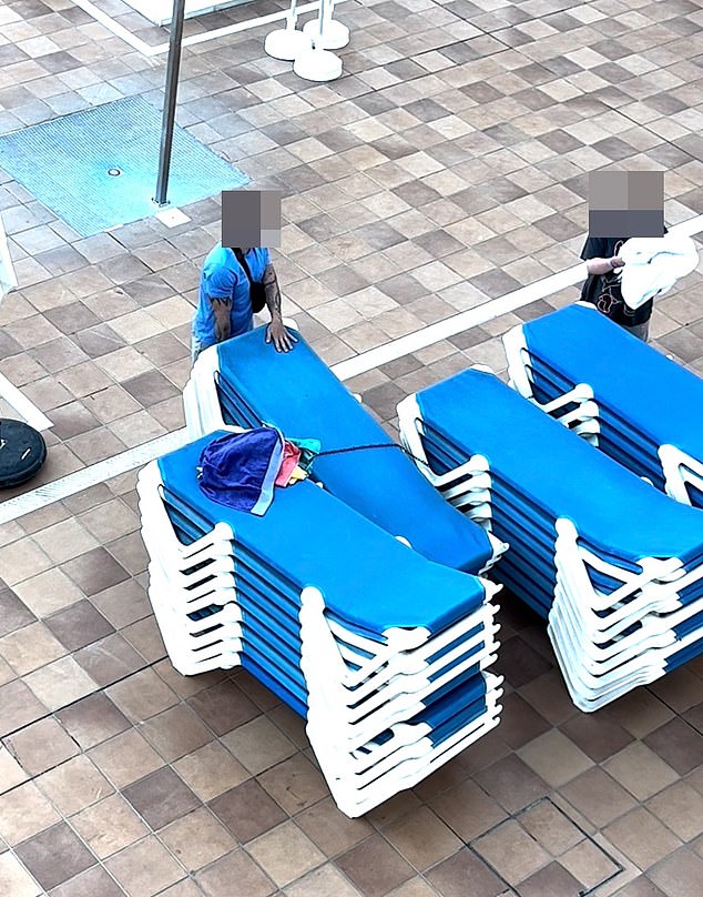 In the video, filmed by a stunned guest, a man dressed in a T-shirt, shorts and flip-flops can be seen rearranging the deck chairs to free five people trapped underneath.