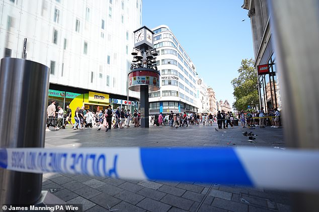 The cordon is located next to the LEGO store and in front of the M&M store, and families and tourists are still queuing for each