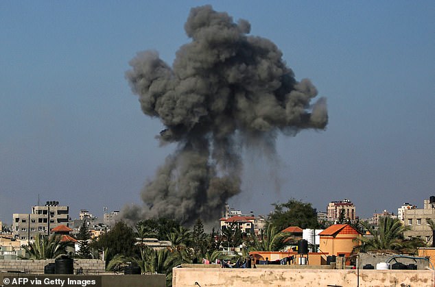 Smoke clouds after the Israeli bombardment in Nuseirat in the central Gaza Strip on August 11, 2024, amid the ongoing conflict between Israel and the Palestinian militant group Hamas