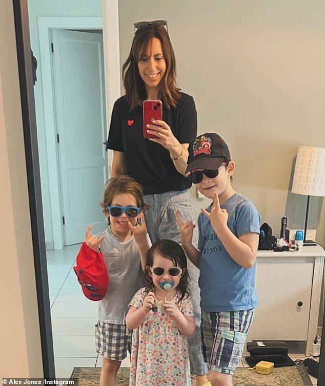 Alex and the insurance broker, who have been married for nine years, have sons Teddy (right), seven, Kit (left), five, and daughter Annie (center), three.