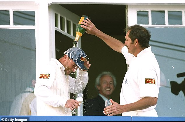 Graham Gooch showers Graham Thorpe with champagne after his century on his debut against Australia