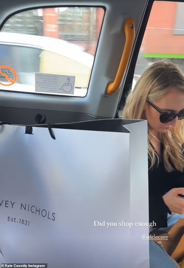 Kate shared a photo of gorgeous garments hanging on a rack before snapping her taxi full of bags from high-end stores including Harvey Nichols, Selfridges and BOSS