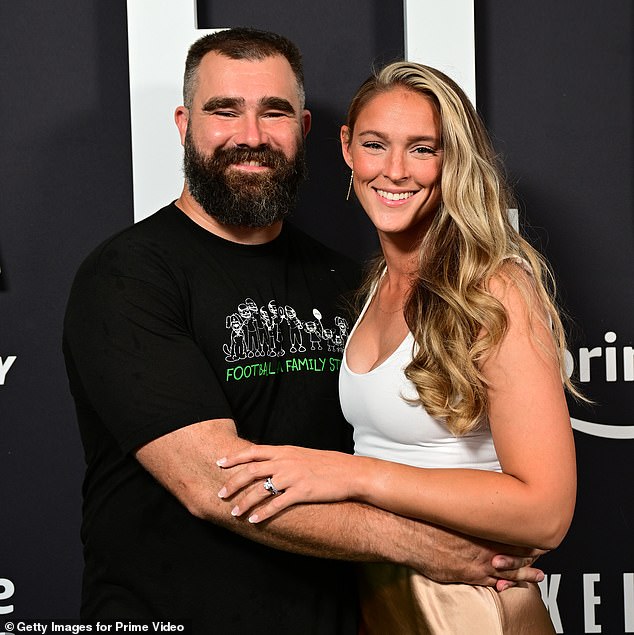 Kelce, pictured with wife Kylie, says his weight loss means a return to the NFL won't happen