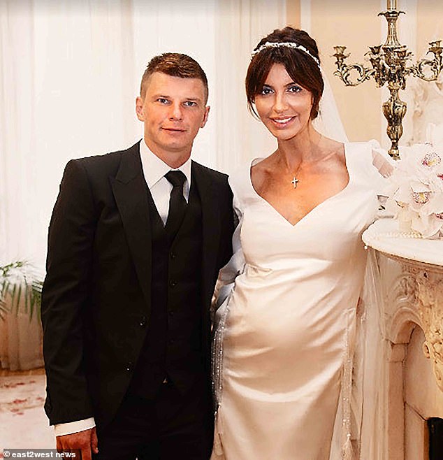 Kazmina, who married Russian winger Arshavin (pictured from the wedding) in 2016, watched in horror as her nose rotted away as her immune system turned against her own body and began eating her face