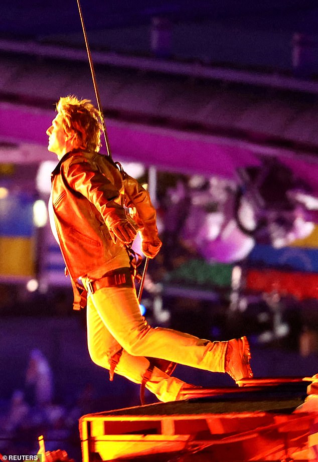 The 62-year-old A-list star jumped from the roof of the Stade de France on Sunday night in a breathtaking spectacle