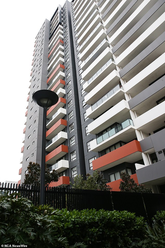 The woman's partner, also 21, jumped from a balcony in the apartment complex (pictured) to his death, after which police found his body in the building's courtyard