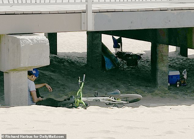 The unprovoked attack is believed to have taken place under a promenade outside a hotel housing asylum seekers (pictured), right on this sandy stretch next to the famous promenade