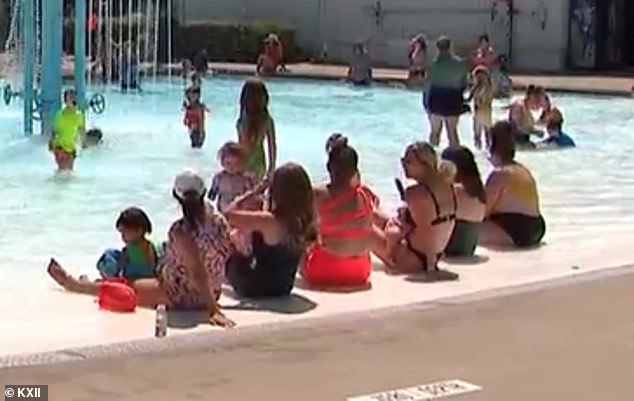 Video footage of the moment shows more than five women sitting on the edge of the pool and breastfeeding while enjoying the sun