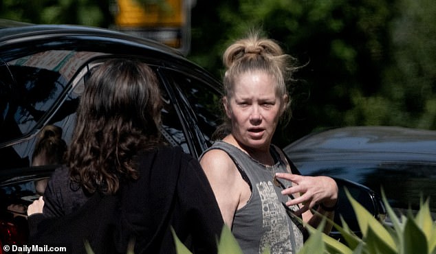 The Married...with Children alum, who was accompanied by a dark-haired friend, wore no makeup and was dressed casually for the outing