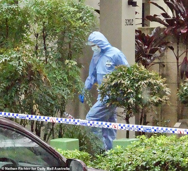 Forensic officers arrived at the house in Carrara on Wednesday following the alleged murder