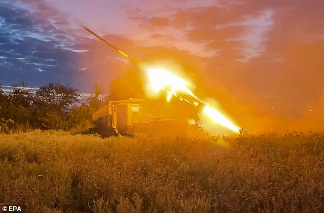 A still image from a handout video from the Russian Defense Ministry shows the BM-21 'Grad', a self-propelled 122 mm multiple rocket launcher, firing near the battle line near Soledar, Donetsk region, Ukraine, August 13, 2024