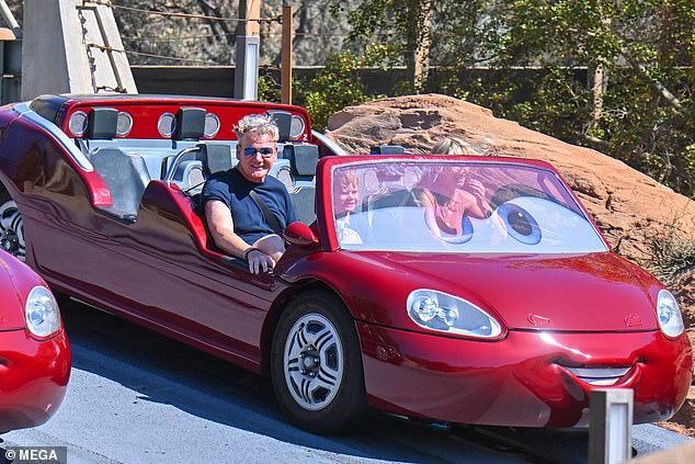 Both father and son beamed as they rode the ride and looked like they were having the time of their lives