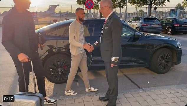 Also pictured at Munich airport was Bayern star Noussair Mazraoui (center)