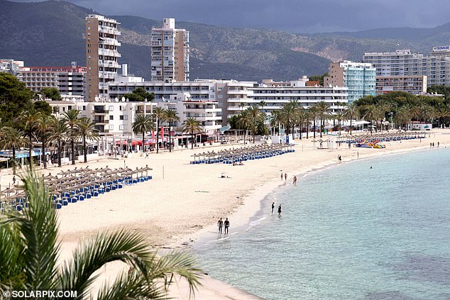 Police are investigating the rape of a British tourist on a beach in Magaluf