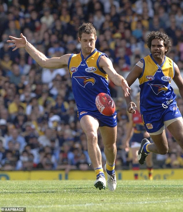 Chris told how Lisa sat him down and told him to shave his head after seeing pictures of his 'thin' hair during the 2006 AFL Grand Final (pictured)