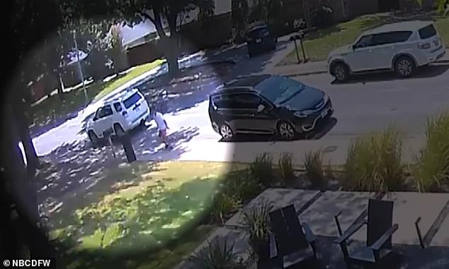 In the terrifying clip, a man is seen getting out of the vehicle and running towards her son Jay, who quickly runs back to his home, before the man runs back to his car.