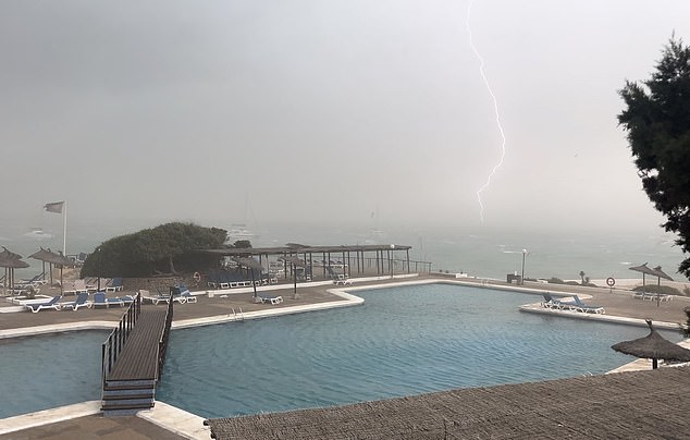 Photo shows lightning striking the sea during a storm in Formentera, Spain