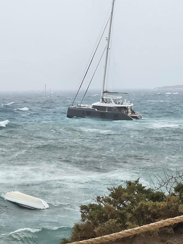 Boats moored in the sea during a storm in Formentera, Spain