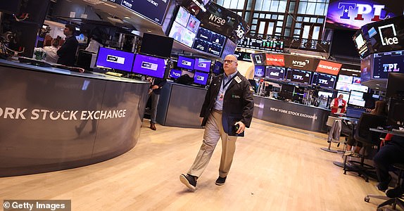 NEW YORK, NEW YORK - AUGUST 12: Traders work on the floor of the New York Stock Exchange during morning trading on August 12, 2024 in New York City. Stocks began falling after the opening bell as the market awaits key inflation data after a week of volatility amid a global market sell-off centered on fears of a U.S. recession. (Photo by Michael M. Santiago/Getty Images)