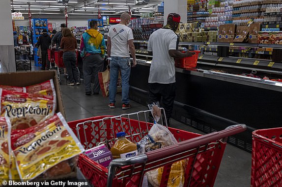 Customers line up to check out at a grocery store in San Francisco, California, U.S., on Thursday, Nov. 11, 2021. U.S. consumer prices rose last month at their fastest annual pace since 1990, confirming the high inflation that has marked the recovery from the pandemic and sapping purchasing power even as wages rose. Photograph: David Paul Morris/Bloomberg via Getty Images