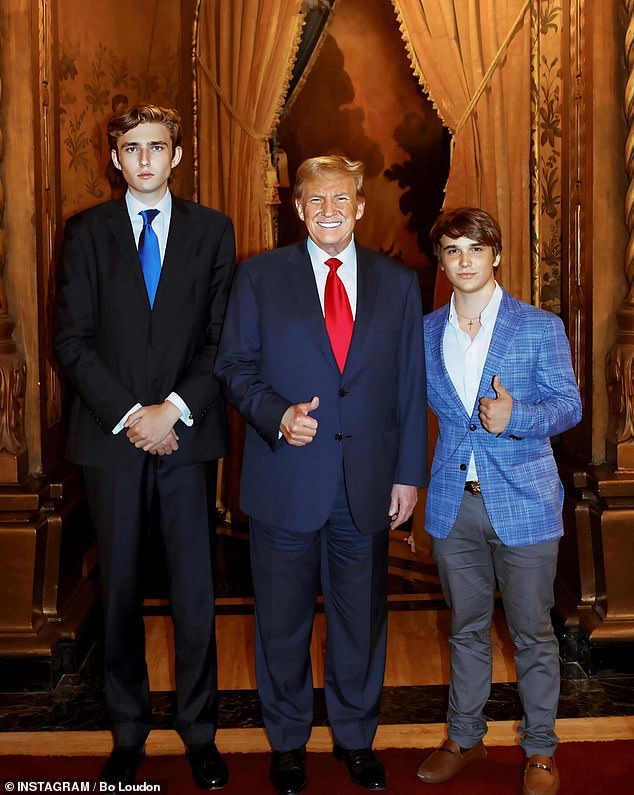 Barron Trump, Donald Trump and Bo Loudon pose for a photo at Trump's Mar-a-Lago home and club