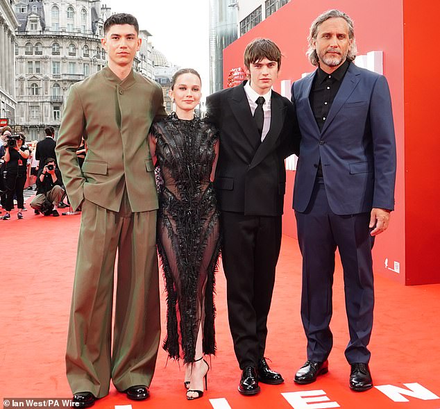 The trio was also joined by the film's director, Fede Alvarez (far right)