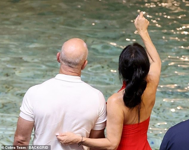 The couple enjoyed their romantic evening in Rome and stopped at the Trevi Fountain