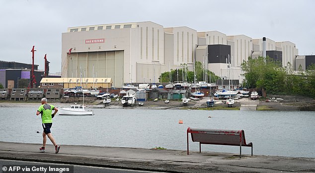 The unnamed target in Cumbria could be the Royal Navy's submarine yard at Barrow-in-Furness, experts believe. Pictured: BAE Systems, where many of the ships are built