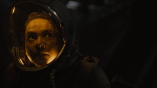 Rain looks back in her spacesuit in Alien: Romulus