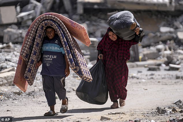 Dutton said the government should impose a freeze on immigration for Gazans amid claims that people fleeing the war could have links to Hamas (pictured: displaced Palestinians in the Gaza Strip)