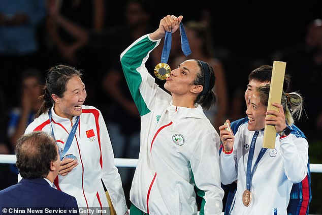 Khelif pictured kissing her gold medal after winning the women's 66kg category