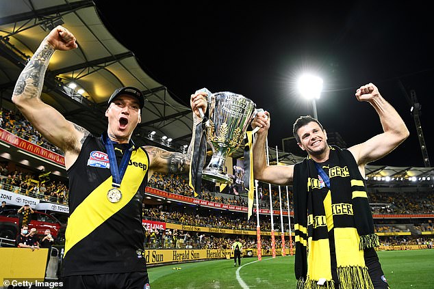 Cotchin (pictured right, with Martin, after winning the 2020 AFL grand final) retired last year, giving him a unique perspective on what 'Dusty' will face in life after football.